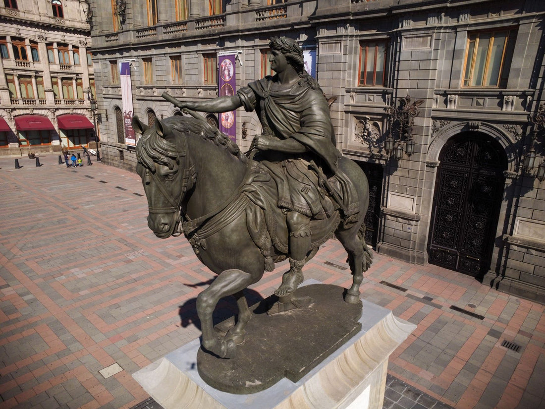 Equestrian statue in a sunlit public square
