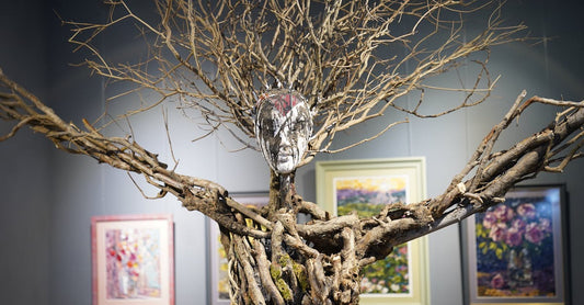 Contemporary figurative sculpture in a gallery space — humor and imagination in fine art