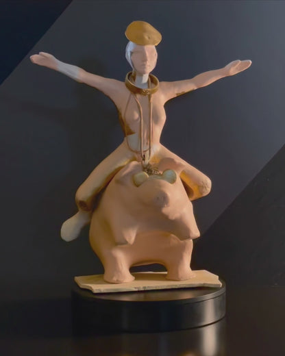 Video of a woman riding a pig