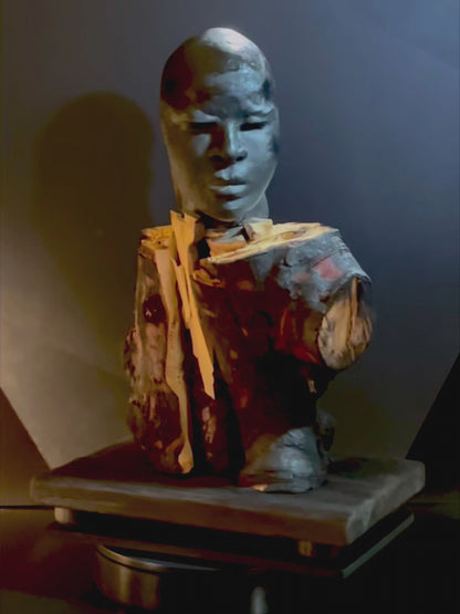 Video of a scuulpture of a man's face